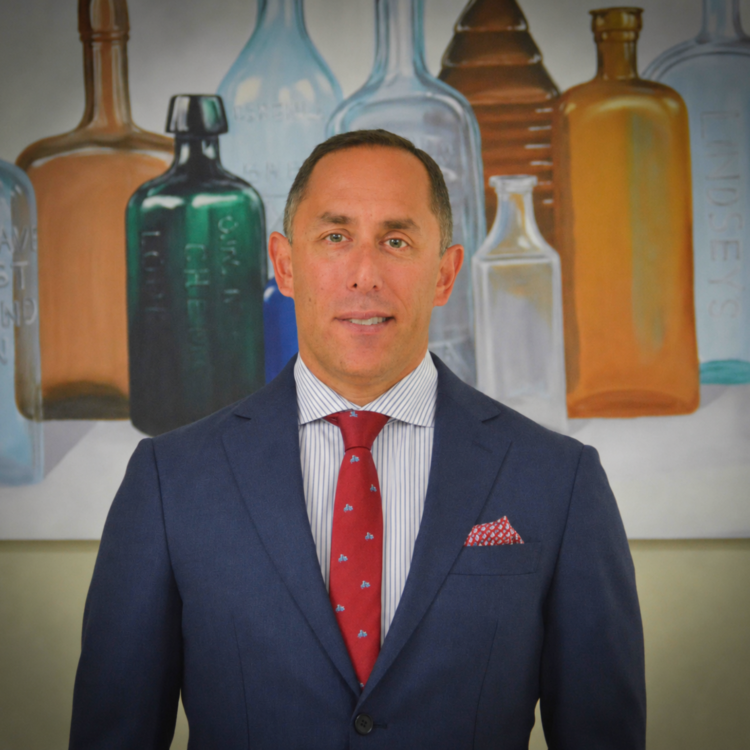 Professional headshot of Spencer Malkin, Chief Executive Officer of SKNV, an FDA-Registered 503B Outsourcing Facility specializing in customized prescription dermatology medications.